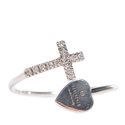 gucci heart and cross ring.